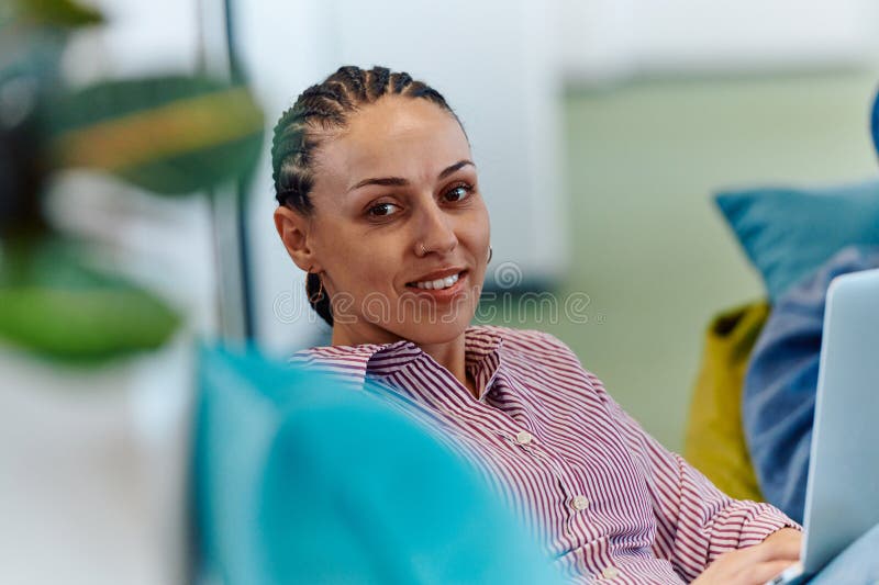 A modern programmer discussing future business projects with colleagues in a modern startup office stock photos