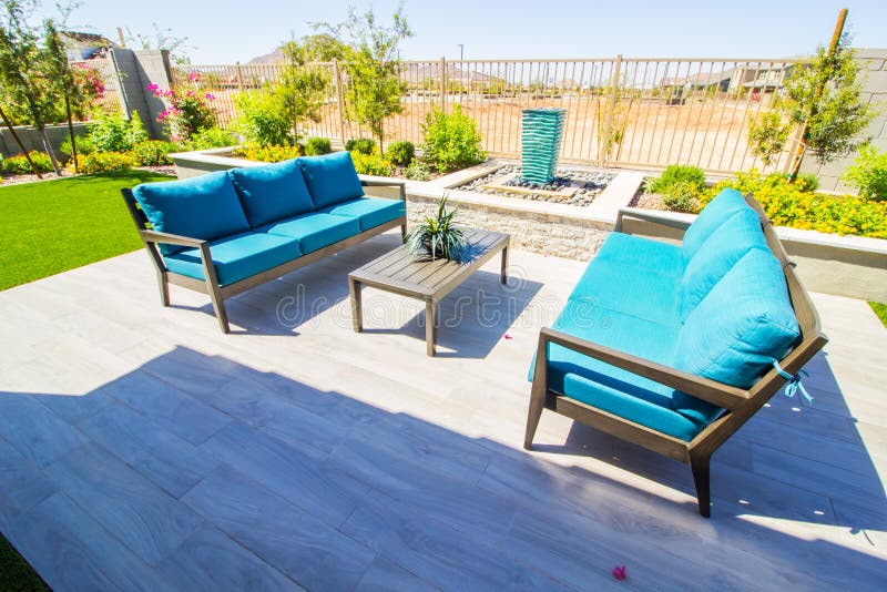 Modern Rear Yard Patio with Double Couches and Coffee Table Stock Photo