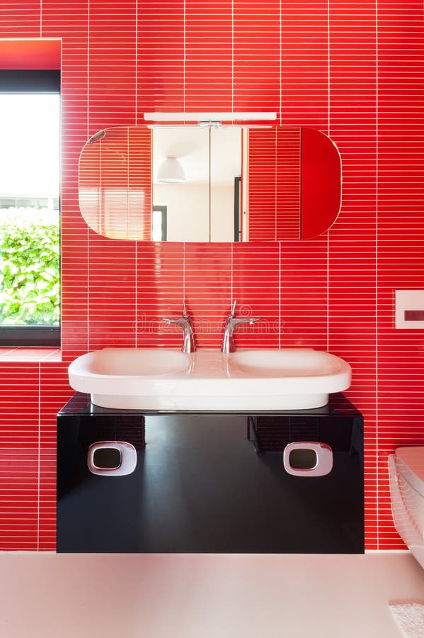 Modern red bathroom stock photo. Image of light, indoor 46721436