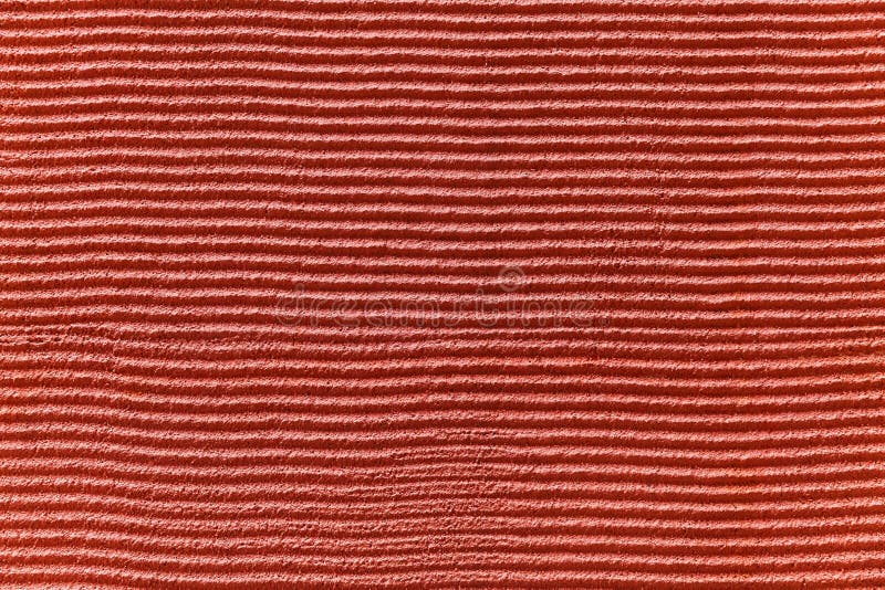 Modern red stone wall with stripes texture