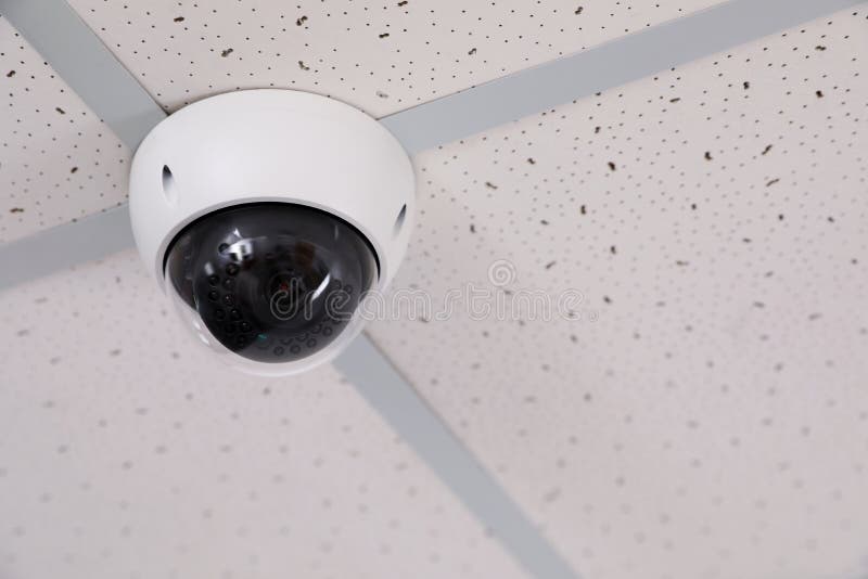 Modern Security Cctv Camera On Ceiling In Office Protection