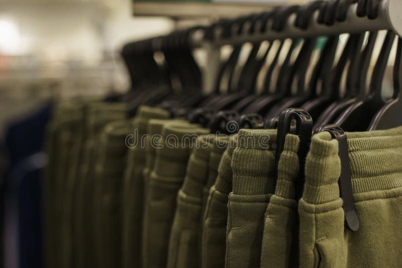 Hoodies, A Sweater And A Hoodie On A Hanger In A Fashion Store For Stock  Photo Image Of Clothes, Cloth: 154966756