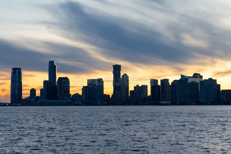 Jersey City Skyline Along The Hudson River During A Sunset Stock Image