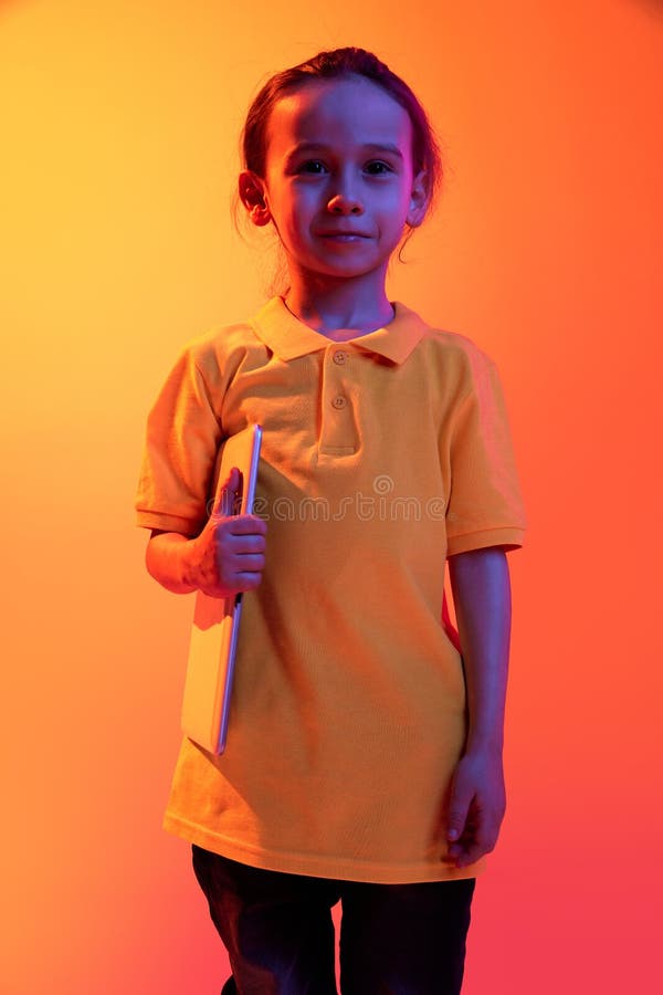 Modern Technologies. Portrait of Little Kid, Child Posing with Tablet