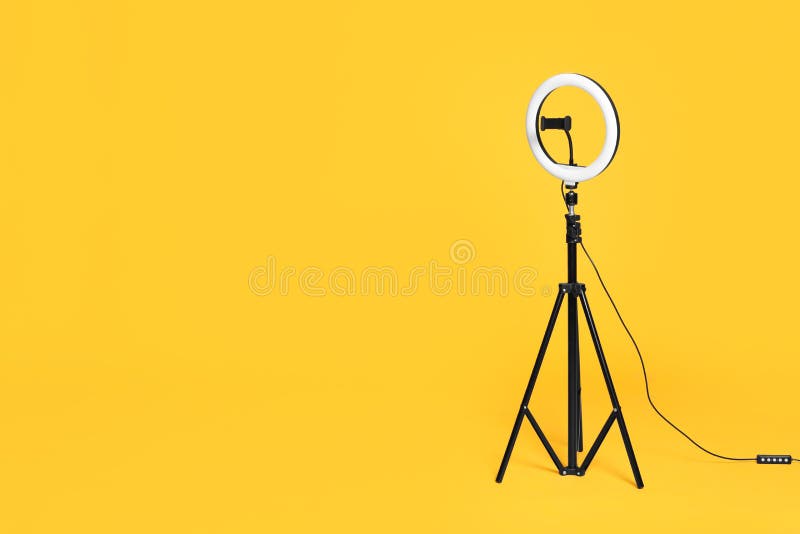 Modern Tripod with Ring Light on Yellow Background. Space for Text Stock  Photo - Image of hobby, accessory: 221205650