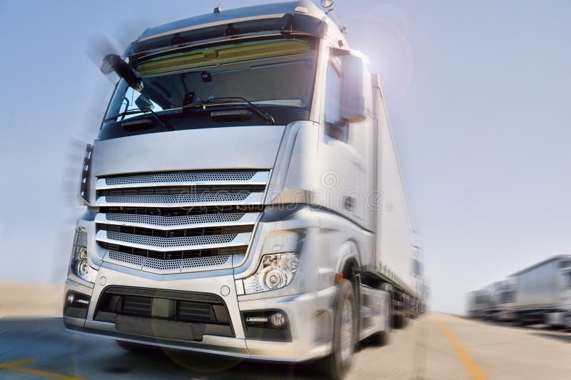 Modern Truck on road motion blur dramatic stock images