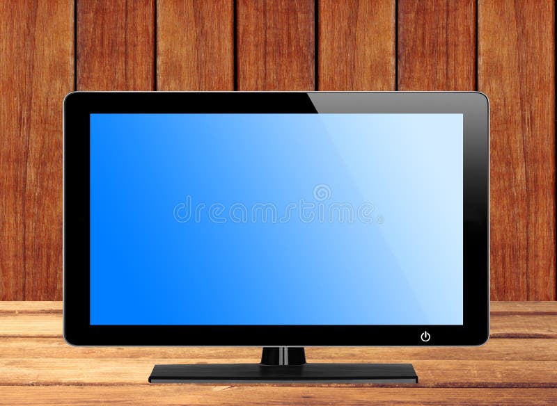 Modern TV Screen with Blue Screen on Wooden Table Stock Photo Image