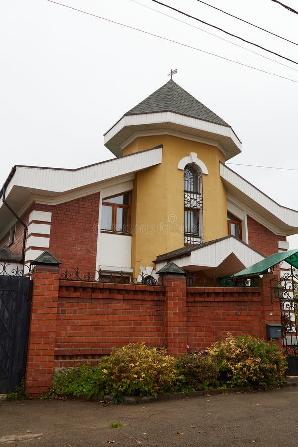 Modern two-storey house made of brick and other materials royalty free stock photo