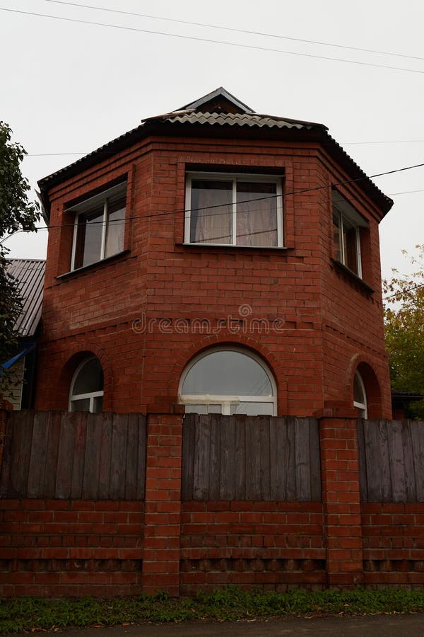 Modern two-storey red brick house royalty free stock photos
