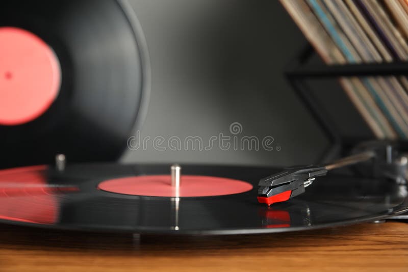 Modern Vinyl Record Player with Disc on Brown Background, Top View. Space for Text Stock Photo
