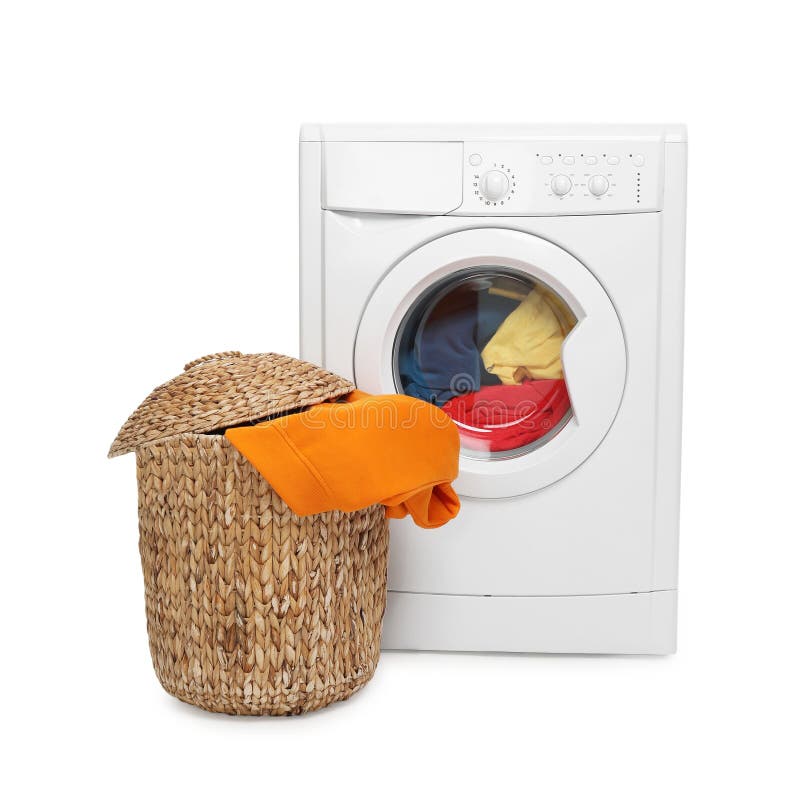 Modern washing machine and laundry basket isolated on white royalty free stock photo