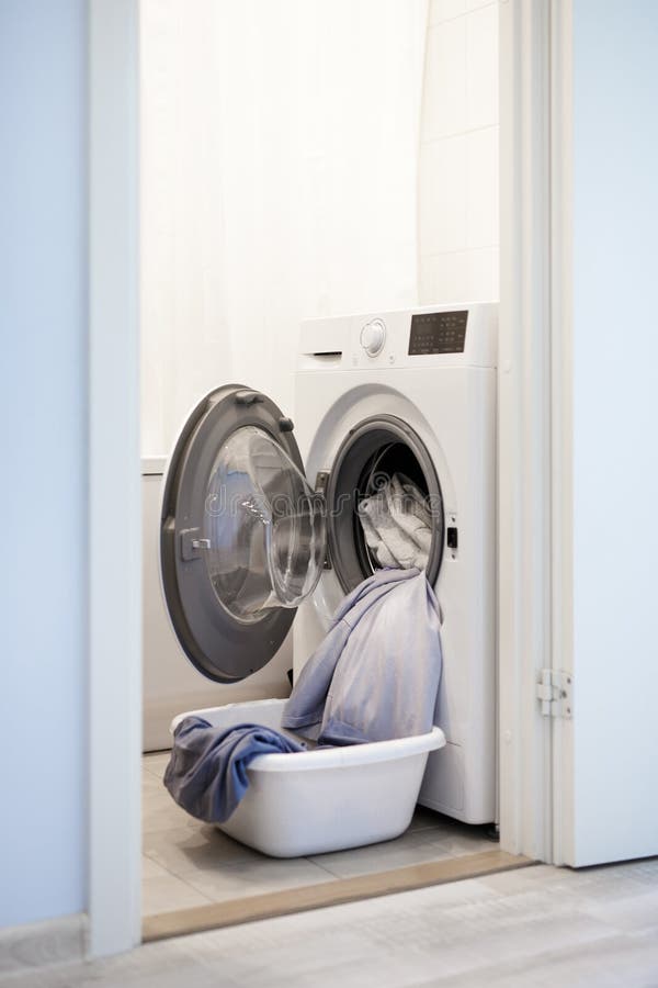 Washing Machine with Laundry in Bathroom Stock Photo Image of