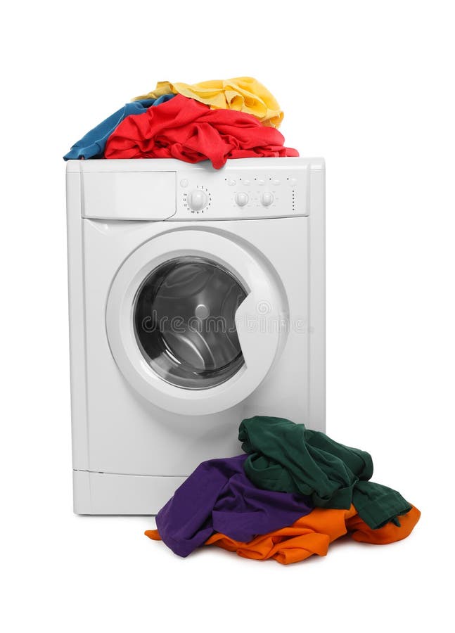 Modern washing machine with laundry isolated on white royalty free stock image