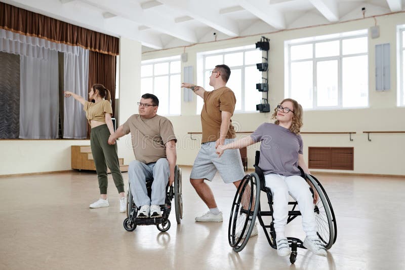 Dance Team Practicing In Spacious Studio stock photo