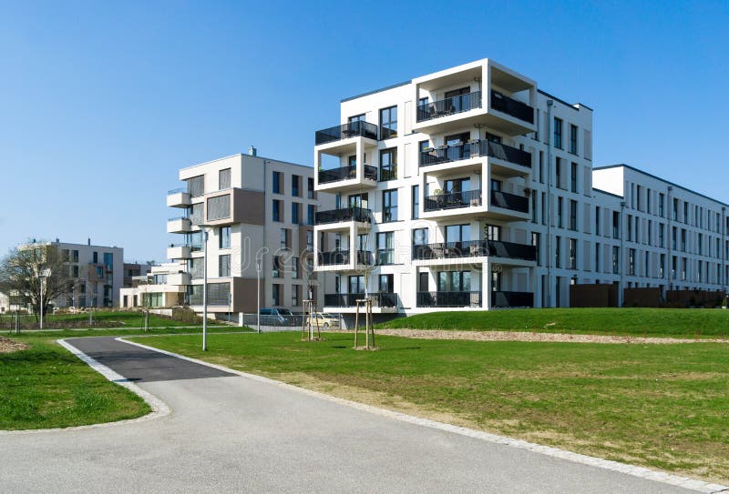 Modern white buildings with balkony