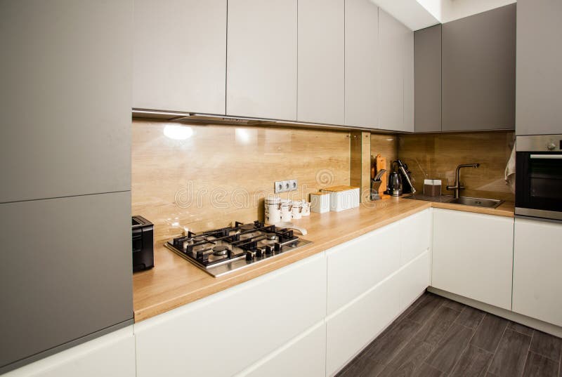 Modern white grey kitchen clean interior design. royalty free stock image Modern white grey kitchen clean interior design. royalty free stock image