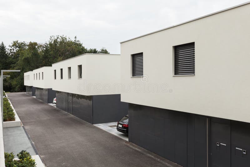 Modern white houses stock image. Image of facade, area 63409741