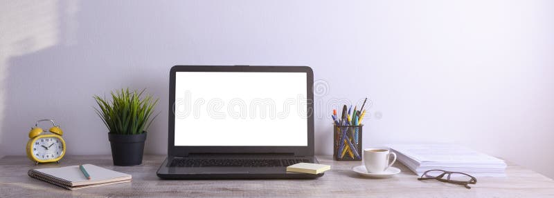 Modern white office desk table mockup ,work space with laptop computer with white screen for you text or royalty free stock photo