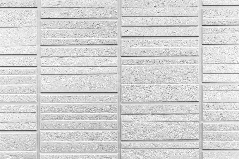 White stone wall with stripes texture and seamless background