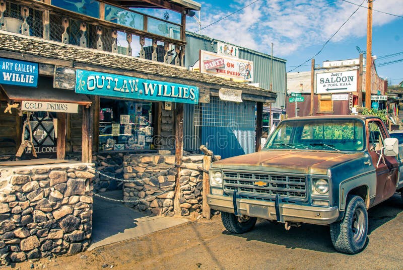 Modern Wild West scenery with tourist shops and old rusty pickup car in Oatman. stock images Modern Wild West scenery with tourist shops and old rusty pickup car in Oatman. stock images