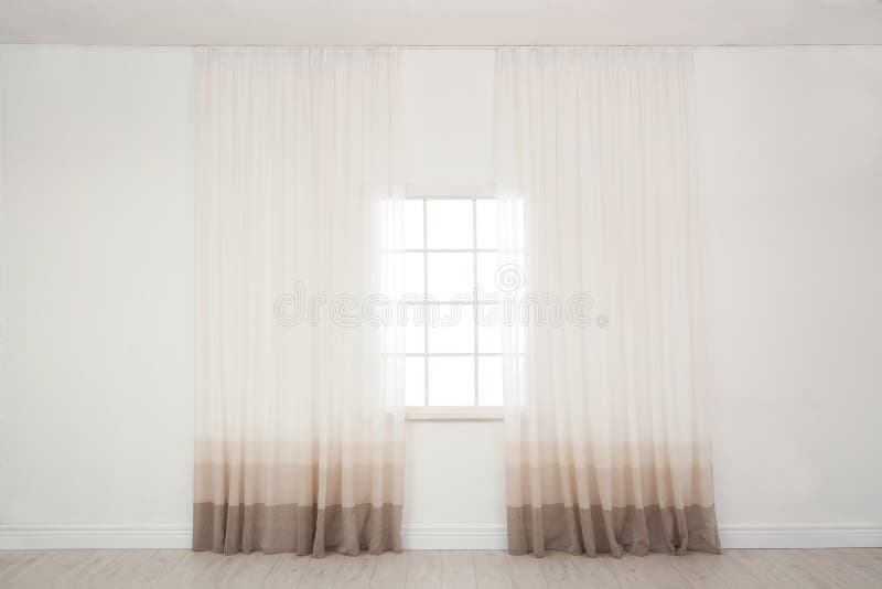 Modern window with curtains in room. stock photography