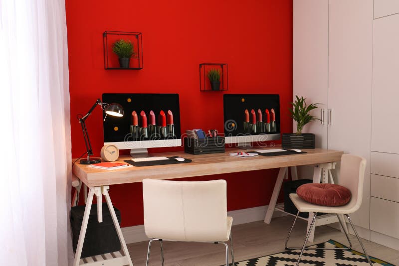 Modern Workplace with Large Desk and Computers in Room Stock Image