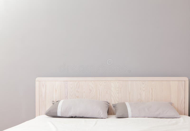 Modern double bedroom with gray wall, great for copy space. Modern double bedroom with gray wall, great for copy space