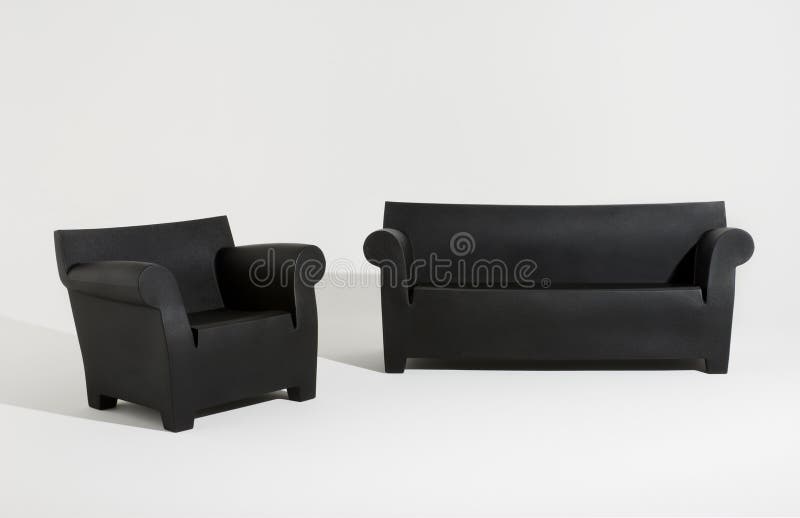 Modern black sofa pair isolated on white background. Modern black sofa pair isolated on white background