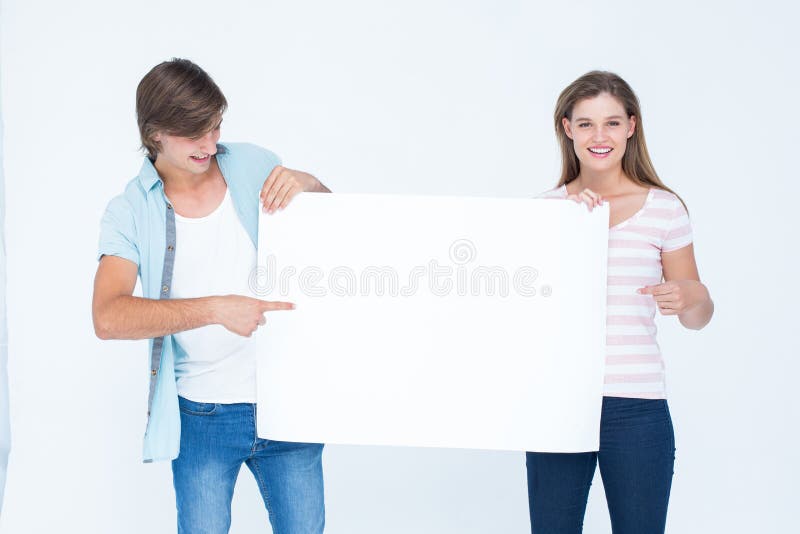 Modniś pary mienia plakat zdjęcia stock