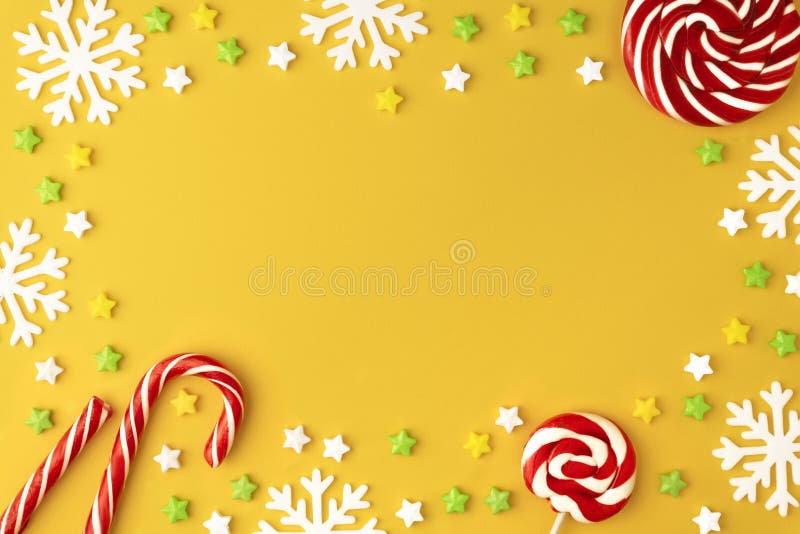 Modèle de Noël avec des bonbons à lucettes autour de l'espace de copie La sucrerie avec le flocon de neige, appartement s'étenden