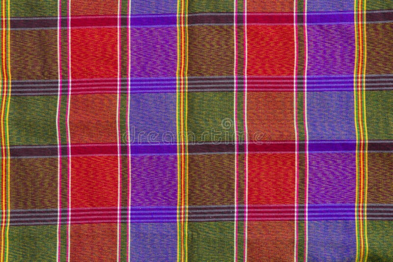 Modèle de plan rapproché et texture du thailandais de tissu de contrôle de plaid de pagne images libres de droits Modèle de plan rapproché et texture du thailandais de tissu de contrôle de plaid de pagne images libres de droits