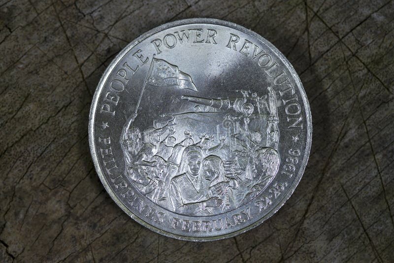 Moeda comemorativa que caracteriza a revolução do poder de povos foto de stock