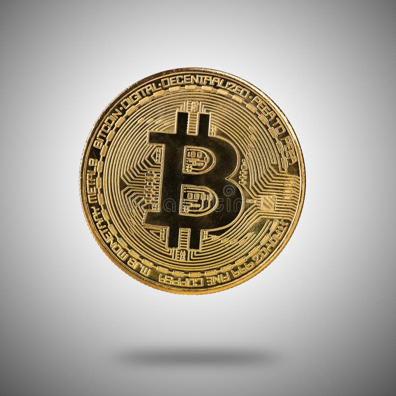 Moeda de ouro de Bitcoin na luz - fundo cinzento foto de stock royalty free Moeda de ouro de Bitcoin na luz - fundo cinzento foto de stock royalty free