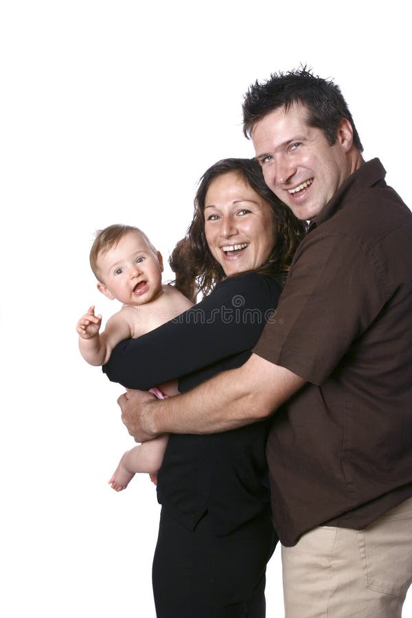 Moeder en vader met babymeisje royalty-vrije stock fotografie Moeder en vader met babymeisje royalty-vrije stock fotografie