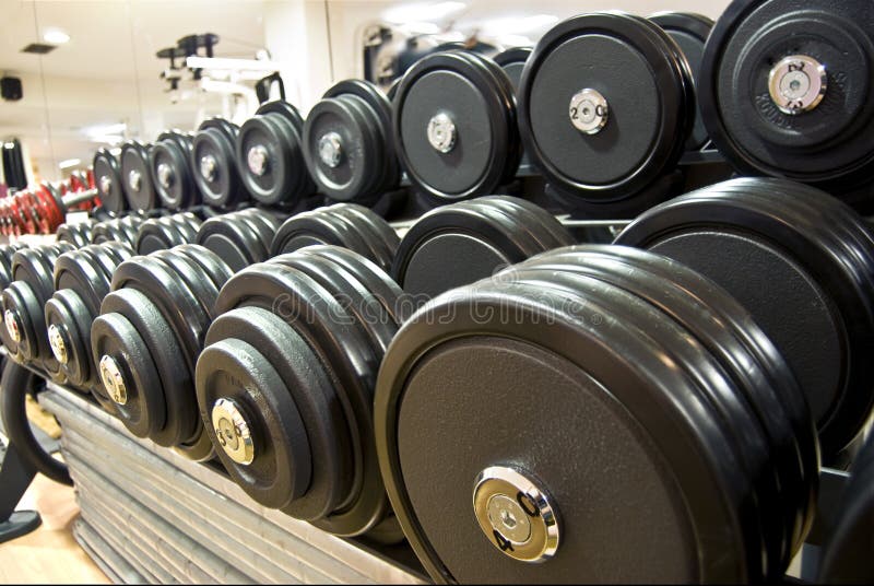 Weights, dumbells in the gym. Weights, dumbells in the gym