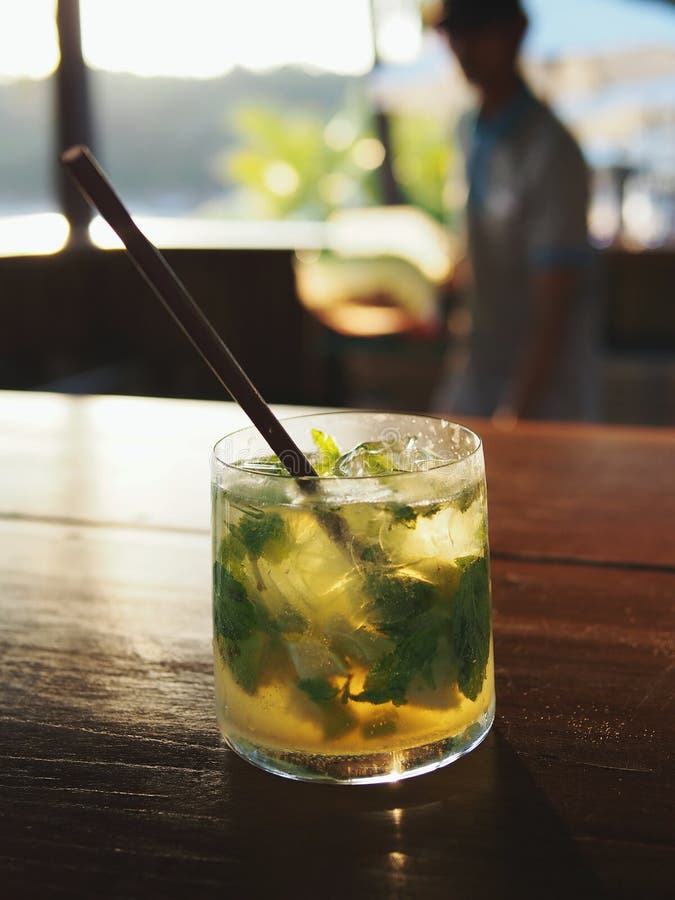 Mojito at a beach bar stock image. Image of alcohol, orange 27384139