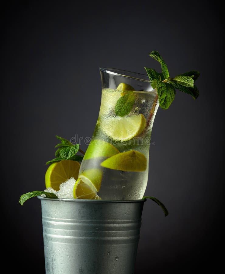 Mojito Cocktail with Ice, Lime, and Mint in a Bucket with Ice Stock
