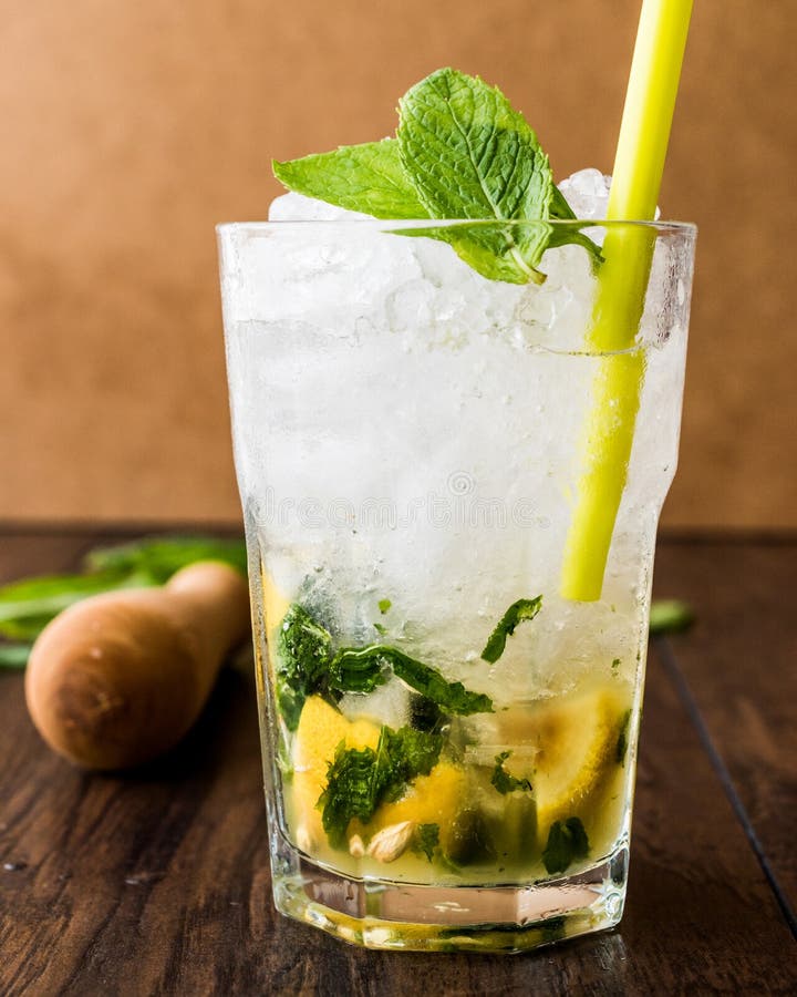 Mojito Cocktail with Lime, Mint Leaves and Ice. Stock Photo Image of