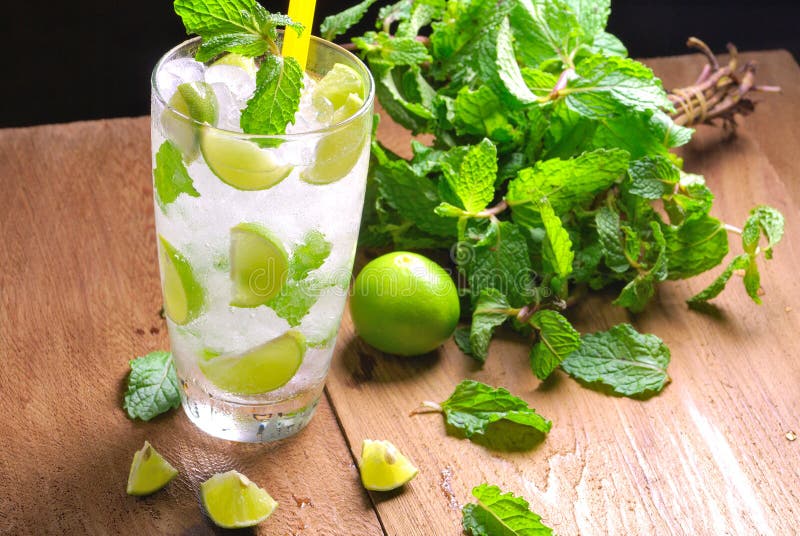 Mojito , Lime Pieces , Leaves of Mint with Ice and Rum Stock Photo