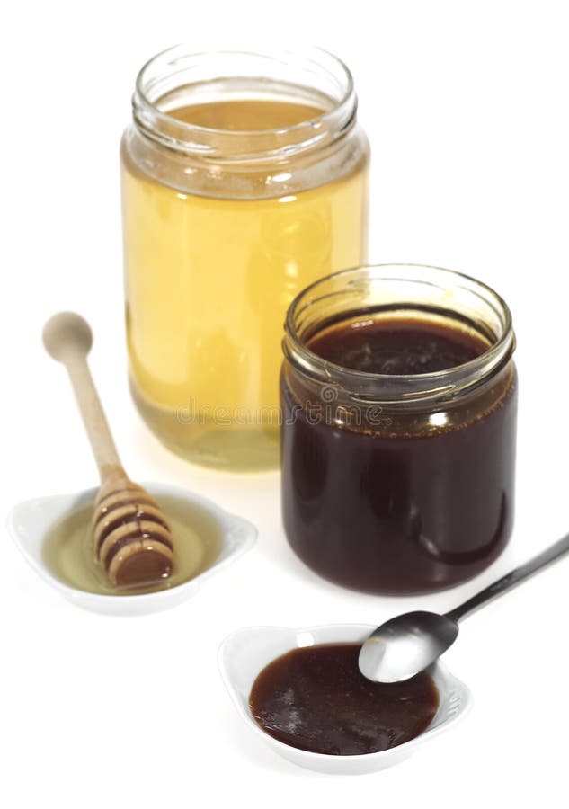 Molasses and Honey Pots Against White Background Stock Photo Image of life, setting 195874690
