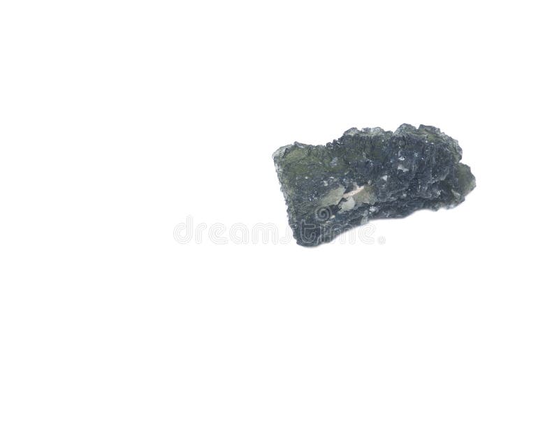 Moldavite - form of tektite found along the banks of the river Moldau in Czech republic, isolated on white background. Moldavite - form of tektite found along the banks of the river Moldau in Czech republic, isolated on white background