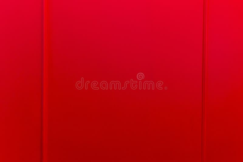 Moldings on a Bright Red Wall. Modern Trends in Decor and Interior