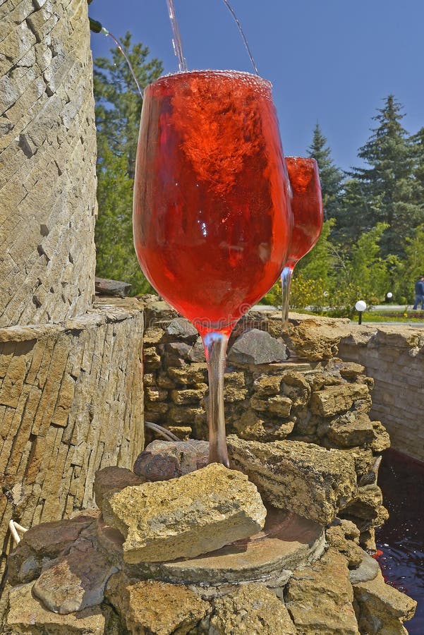 Premium Photo  Decorative fountain in form of pouring wine at the entrance  of milestii mici wine cellars in moldova