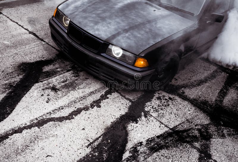 Moldova 25.09.2019. Sport modern Stance E36 BMW Car racing car drifting with smoke drift burnout, Huge clouds with. Moldova 25.09.2019. Sport modern Stance E36 royalty free stock images