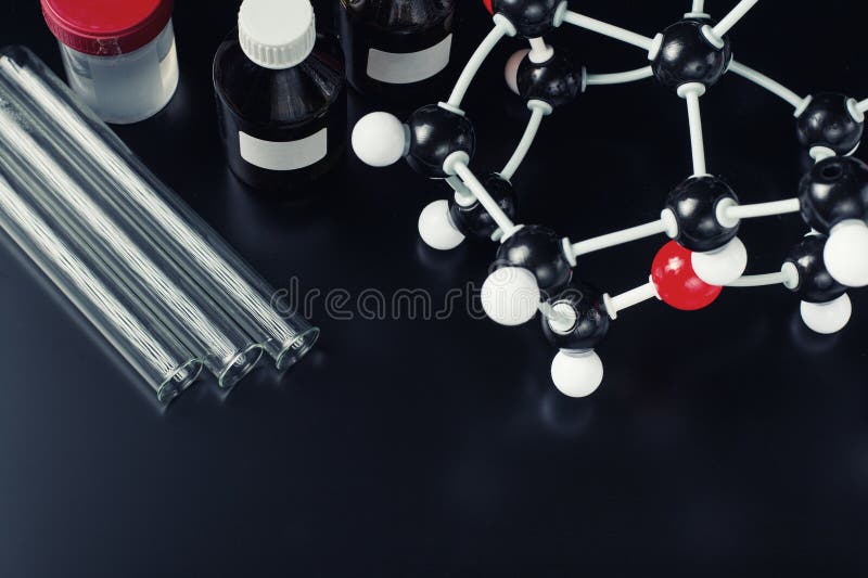 Molecular Formula and Laboratory Equipment on a Blue Background