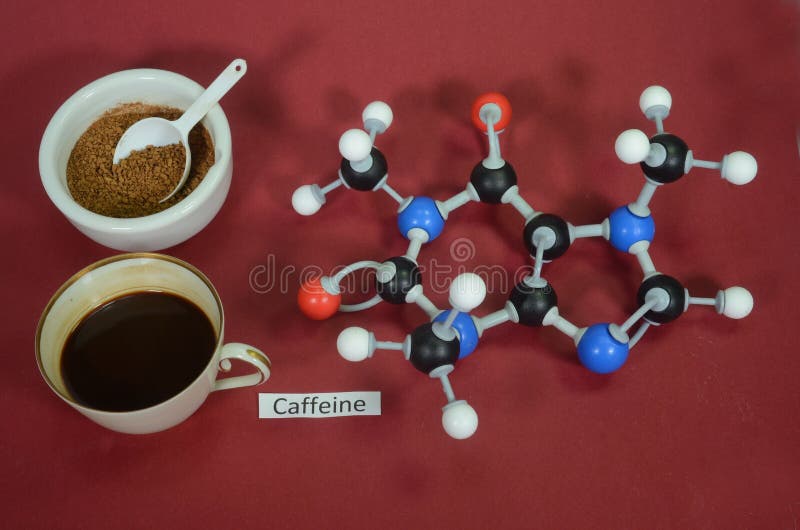 Molecule model of Caffein Coffein. White is Hydrogen, black is Carbon, red is Oxygen and blue is Nitrogen