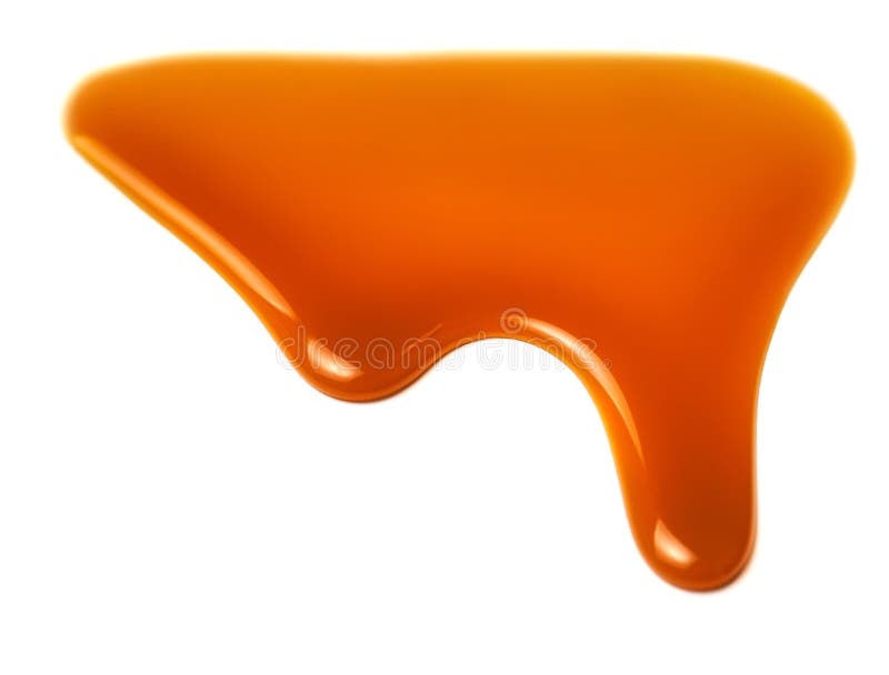 Pouring caramel sauce isolated on white background. Golden Butterscotch toffee caramel liquid. Pouring caramel sauce isolated on white background. Golden Butterscotch toffee caramel liquid