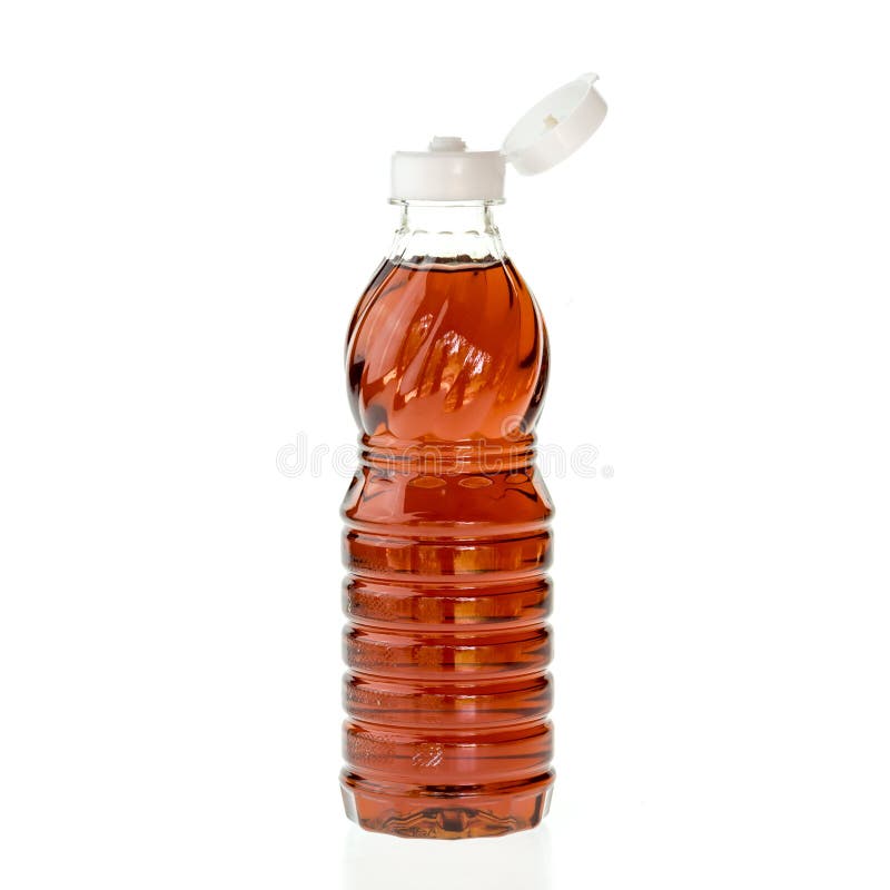 Thai fish sauce in a bottle isolated on white background. Thai fish sauce in a bottle isolated on white background