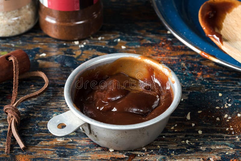 Close up view of BBQ Sauce in a measuring cup. Close up view of BBQ Sauce in a measuring cup