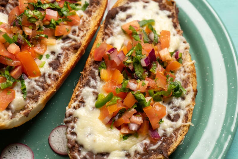 Molletes with Fresh Sauce and Cheese. Mexican Food Stock Image - Image ...